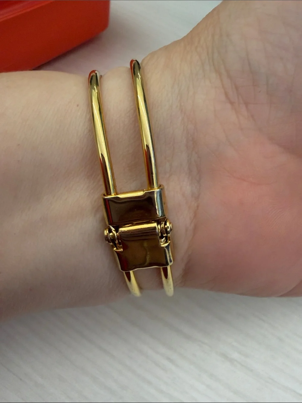 Gold Bangle Bracelet with Red Floral Accent